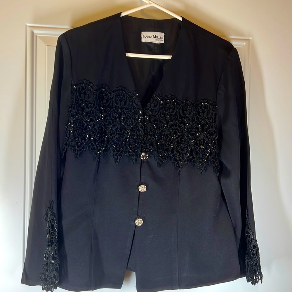 Karen Miller long sleeve blazer or suit.